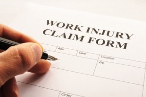 work injury claim form showing business insurance concept